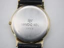 Close-up of the watch's stainless steel case back with "RW Raymond Weil 5542 WATER RESISTANT" engraving.