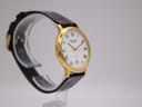 Another angled side view of the Jean Perret QJ watch, showing the crown and case profile.