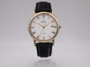 Front view of the Bulova quartz watch with white Roman numeral dial and black leather strap.