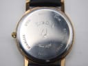 Close-up of the stainless steel case back, showing Bulova branding, serial number 34521, and 3ATM water resistance.