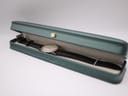 Bulova watch and strap resting inside a plain green watch presentation box (box not included).