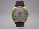 Front view of the Roamer Searock automatic watch with a gold-toned tonneau case, silver dial, and brown leather strap.