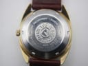 Close-up of the stainless steel screw-down case back, showing "Roamer automatic", "water resistant", "Swiss made".