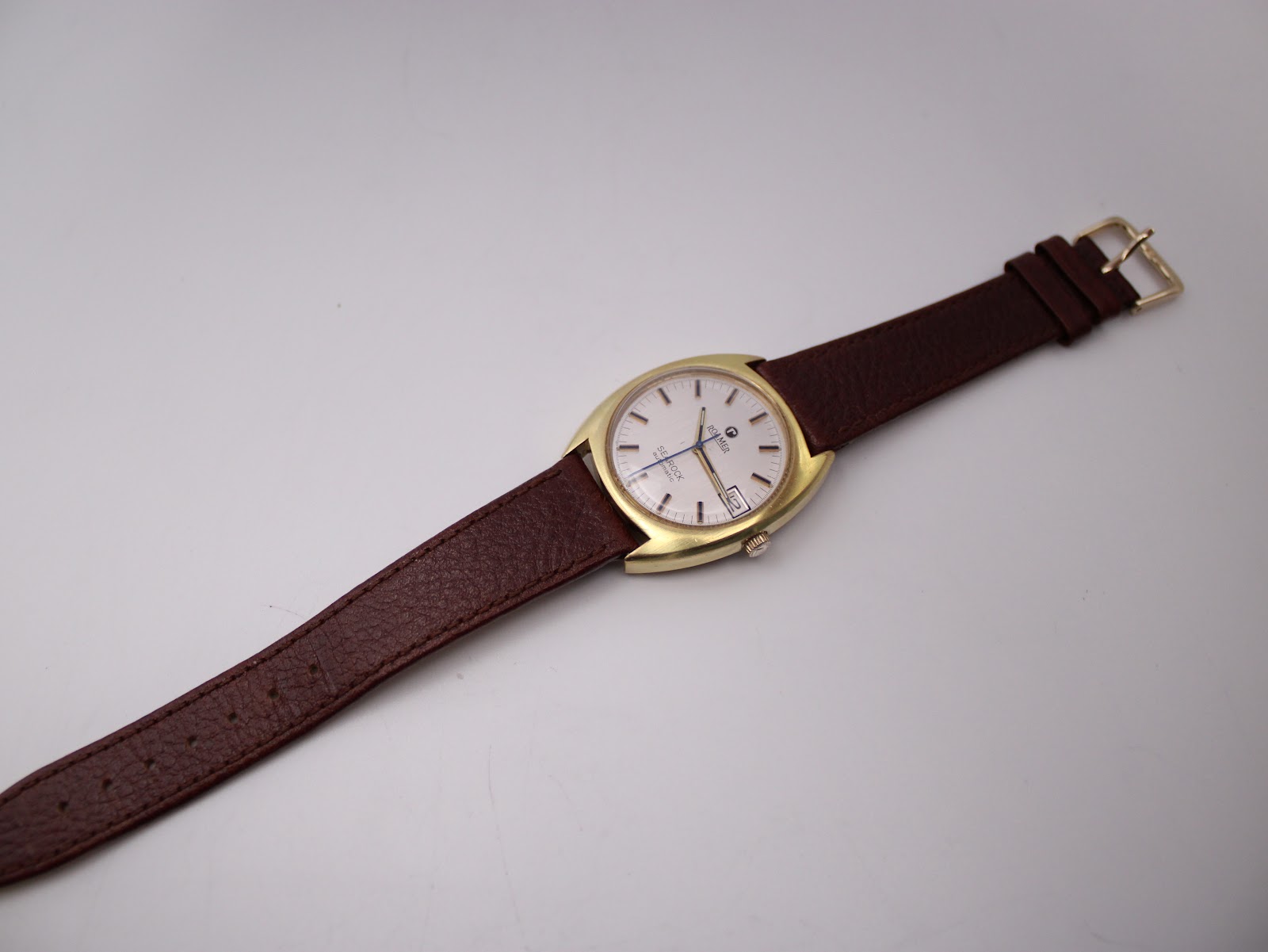 Full length view of the Roamer Searock watch from an angle, showcasing the strap and overall aesthetic.