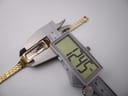 Digital caliper measuring the width of the Seiko watch case, displaying 12.45mm.