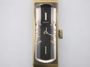 Close-up front view of the Seiko 1520's black dial with vertical brushing, gold baton indices, and 'SEIKO' logo.
