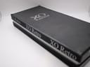 Top view of the black XO RETRO presentation box, showing the brand logo and name printed on the lid.