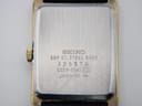 Close-up view of the stainless steel case back of the Seiko watch, with "SEIKO SGP ST. STEEL BACK 3D5570 E029-5540 JAPAN-MS" engravings clearly visible.