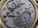 Detailed view of the Roamer watch's manual wind movement, showing gears and 'Roamer Watch Co Swiss Seventeen 17 Jewels' engraving.