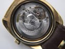 Close-up view of the Certina 25-651 automatic movement inside the watch, showing '28 JEWELS' and 'SWISS' markings.