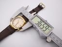 Digital caliper measuring the Certina 288 watch case diameter, displaying 36.59mm.