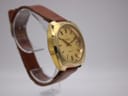 Another angled view of the Eterna 407 T watch, highlighting the side profile of the case and strap.