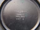 Close-up of the stainless steel case back engraving 'Eterna Watch Co Swiss Stainless Steel Back 407 T'.