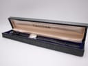 Open original Certina watch box with the Certidate watch on a black leather strap inside, against a white background.