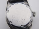 Close-up of the Certina Certidate watch case back, showing engraved serial number 6785189 and model details.
