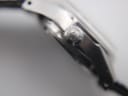 Detailed close-up of the fluted, unsigned crown of the Certina Certidate watch.