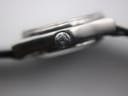 Extreme close-up of the Zenith Espada watch crown with an intricate embossed logo or pattern.