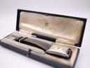 Vintage blue watch box by Perry Greaves Birmingham, with the PRONTO watch nestled inside on a white background.
