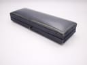 Closed view of the vintage navy blue Perry Greaves Birmingham watch box, showing its textured exterior.