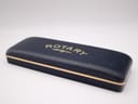 Closed original blue Rotary watch box with gold lettering on the lid, presented against a white background.