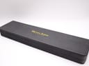 Exterior view of the rectangular black Michel Jordi presentation box with gold branding.