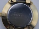 Close-up of the watch's case back, showing the serial number '3401' engraved and some surface scratches.