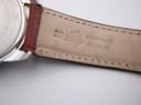 Inside view of the brown leather strap showing "20" (lug width) and "Handmade Belgium" engraving.