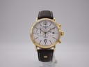 Front view of the Roamer Vanguard gold-toned chronograph watch with a white dial and brown leather strap.