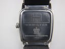 Close-up of Hamilton H163110 case back, showing 'Hamilton', 'Water Resistant 50M', 'Stainless Steel', and model number H163110.