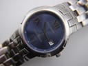 Detailed view of the Gianni Sabatini blue dial with applied silver Roman numerals, stick markers, and date window at 3 o'clock.
