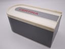 Closed view of the original Certina watch box in grey and white with the red "CERTINA" logo