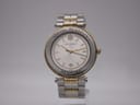 Front view of Michel Herbelin Newport two-tone watch with white dial and gold accents on a white background.