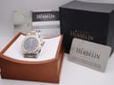 Michel Herbelin Newport watch displayed in its original wooden box, accompanied by papers and guarantee card.