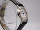 Left side profile of the Michel Herbelin watch, highlighting the two-tone case design.