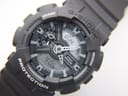 Detailed close-up of the Casio G-Shock GA-110C ana-digi dial, showing the hands, sub-dials, and digital time display.