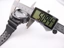 Digital caliper measuring the case diameter of the Casio G-Shock GA-110C, displaying 50.94mm.