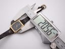 Digital caliper measuring the width of the watch case, displaying a precise measurement of 20.66mm.