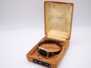 The Maurice Lacroix watch elegantly presented inside its vintage brown velvet-covered original presentation box with the 'Maurice' label.