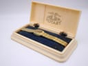 Angled view of the Rotary ladies watch presented in its original cream-coloured plastic box with embossed logo.