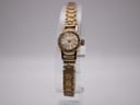 Front view of the gold-tone Rotary ladies' watch with cream dial on a clear stand.