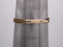 Gold-tone expansion bracelet of the Rotary watch on a wrist sizing cone, showing approx. 18.3cm circumference.