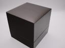 Top and side view of the closed original brown Gucci watch box with the 'GUCCI' logo embossed.
