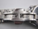 Close-up of the interior of the stainless steel folding clasp, engraved with 'GUCCI' and 'STAINLESS STEEL'.