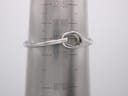 The Gucci watch bangle closed on a wrist sizing cone, indicating a circumference measurement of approximately 160mm (16cm).