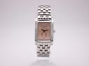 Front view of the Longines 7751 rectangular quartz watch with a rose gold dial and stainless steel bracelet.