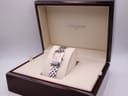 The Longines 7751 watch displayed open inside its original dark wooden Longines presentation box.