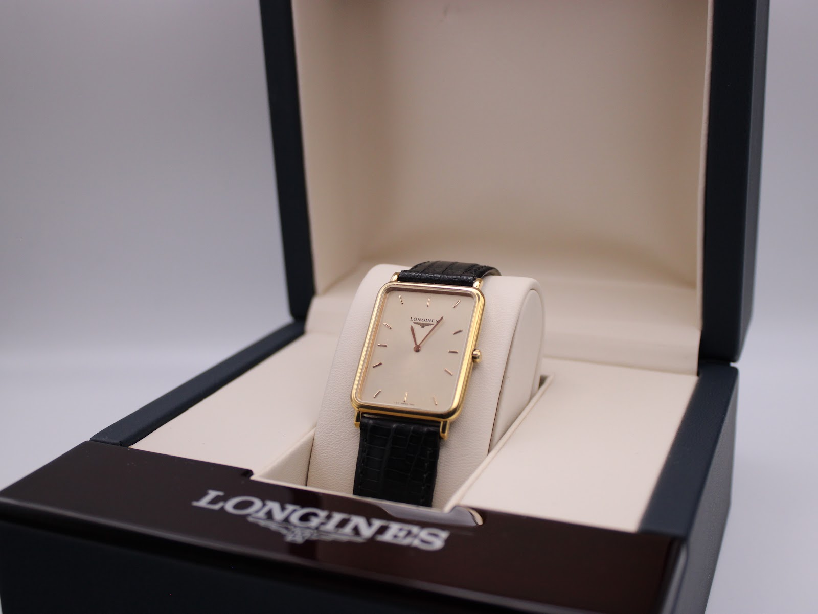 The Longines Les Grandes Classiques watch presented inside its original dark blue Longines presentation box.
