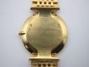 Detailed view of the gold case back, engraved with 'La Grande Classique de Longines' and serial number 32524607.