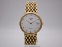 Front view of the Longines Flagship gold-tone quartz watch on a display stand, showcasing its white textured dial and gold bead-of-rice bracelet.