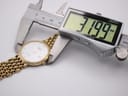 Digital caliper measuring the case diameter of the Longines Flagship watch, displaying an exact measurement of 31.99mm.